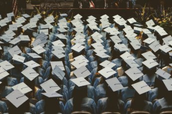 sea of graduates with lots of student debt