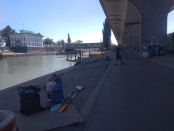 4 packing up luggage under bridge Vienna Austria kayak canoe