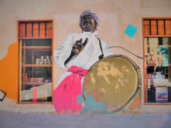 ajman heritage district street art man music