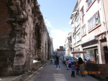 17 Aqueduct of Valens neighborhood kids playing in the streets istanbul turkey