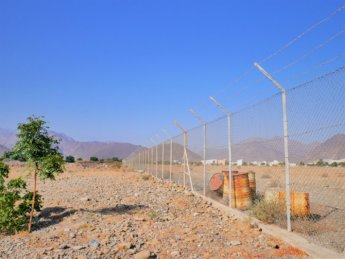 8 abandoned oil barrels Madha airfield Oman exclave UAE runway airport