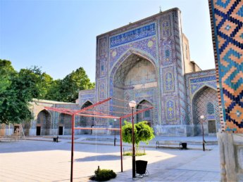7 carpet beaters madrasah Uzbekistan Samarkand