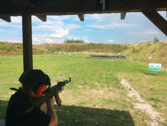 Iris shooting AK-47 kalashnikov rifle