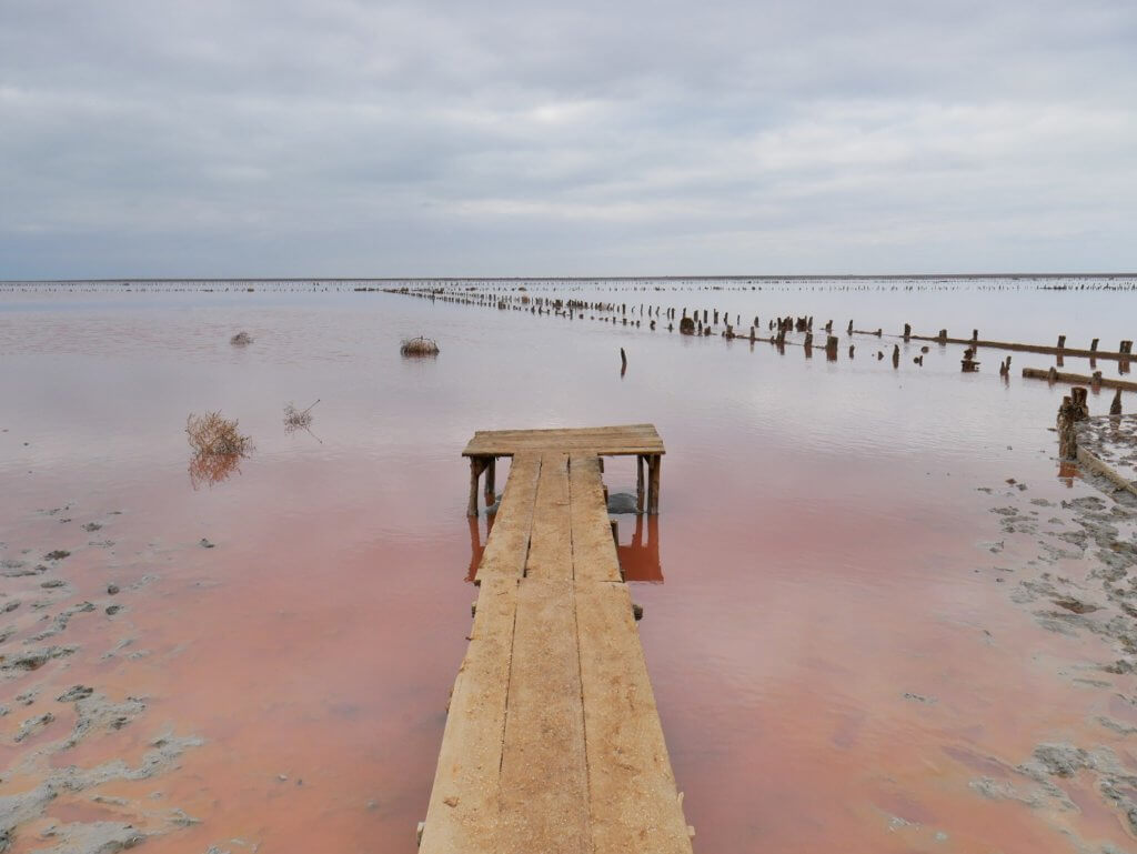 Arabat Spit Pink Lake Heniches'k Lake Crimea Ukraine pier