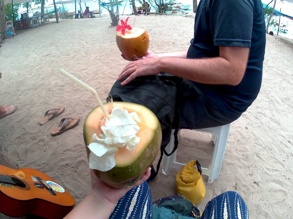 10 drinking a coconut water on Île aux Bénitiers Mauritius Mario's