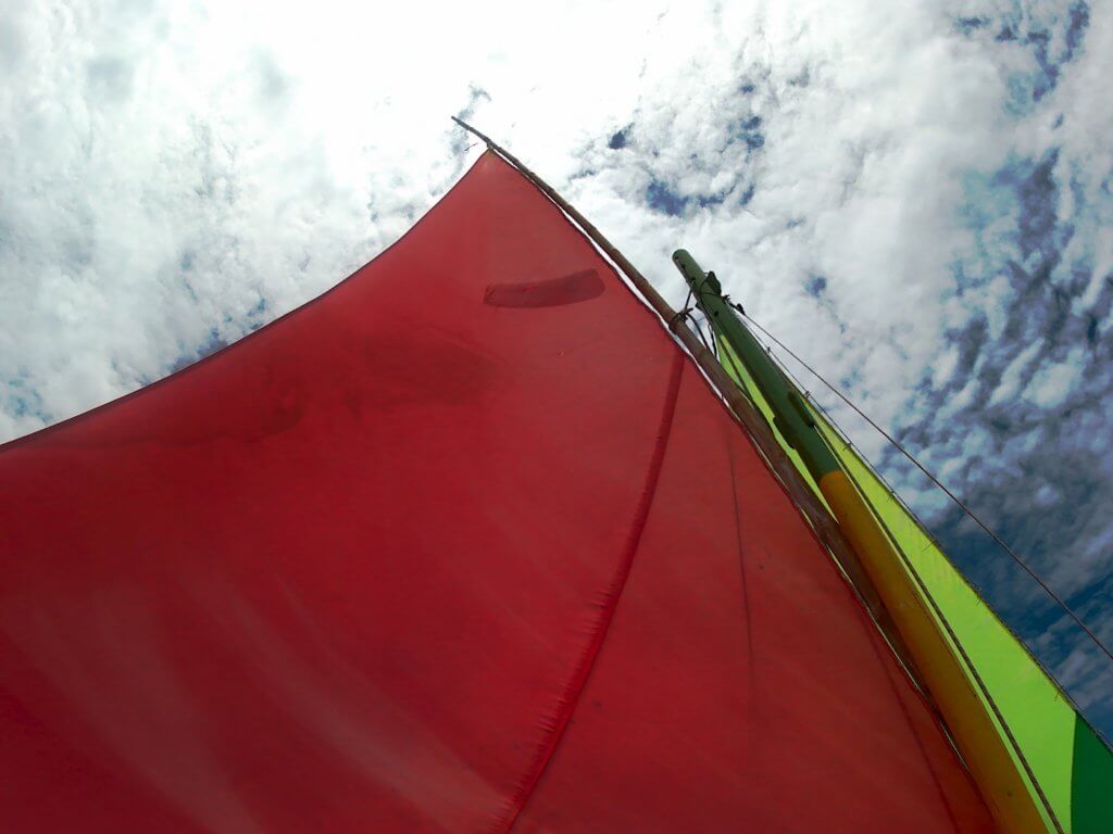 2 mainsail and jib on a pirogue sailing boat Mauritius