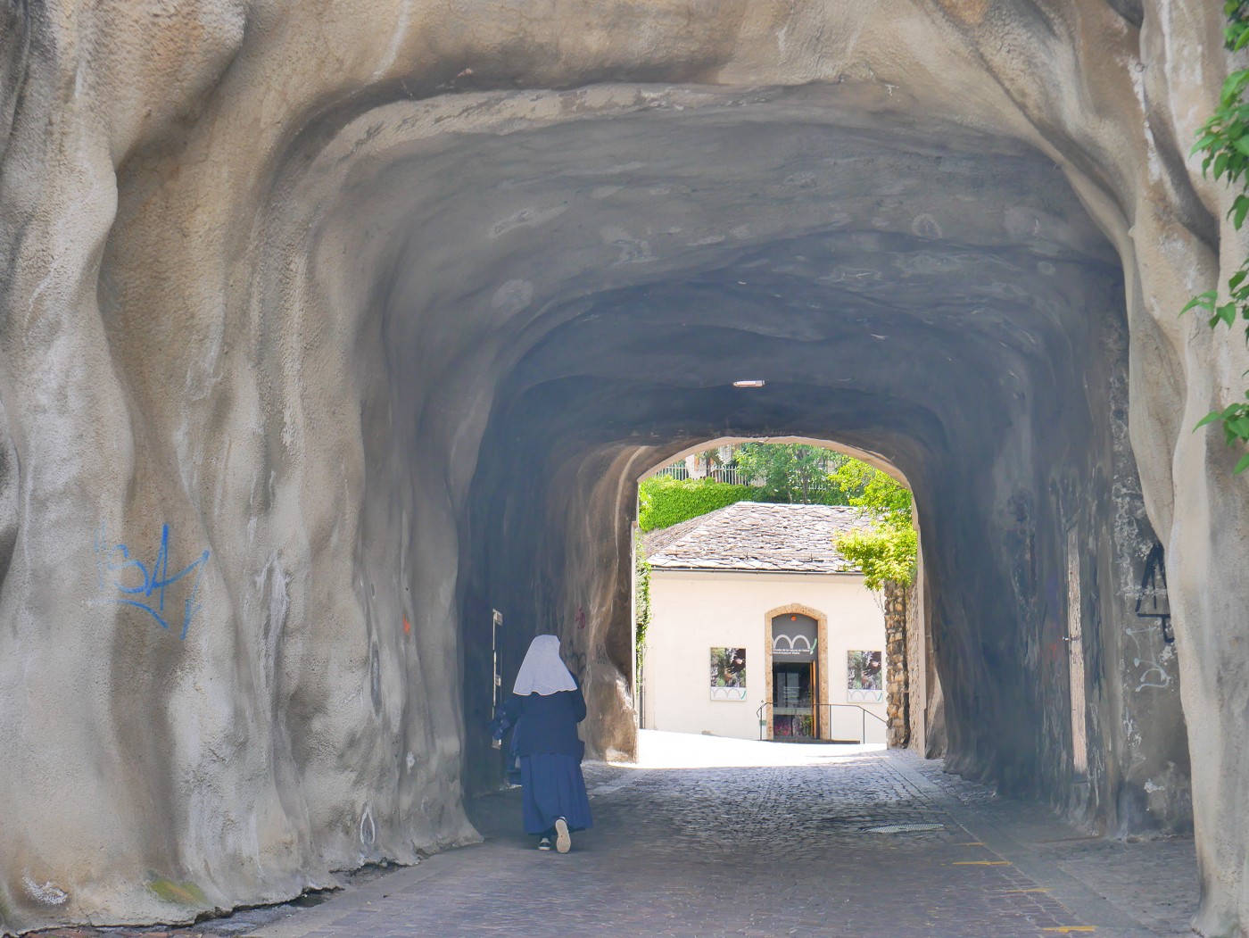Nun in tunnel in Sion Valais Switzerland