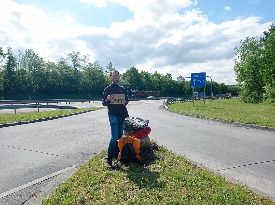 Hitchhiking to Bern from Freiburg im Breisgau Germany via Basel service station Bad-Bellingen first time Jonas Switzerland