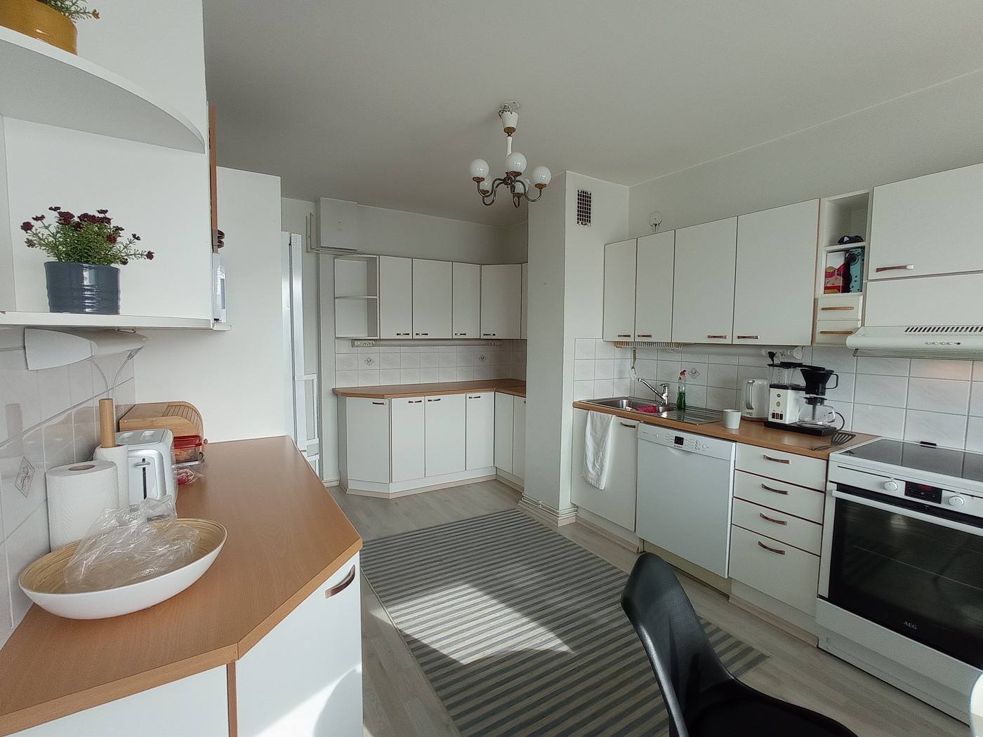 spacious kitchen Oulu well-equipped stocked pantry Airbnb