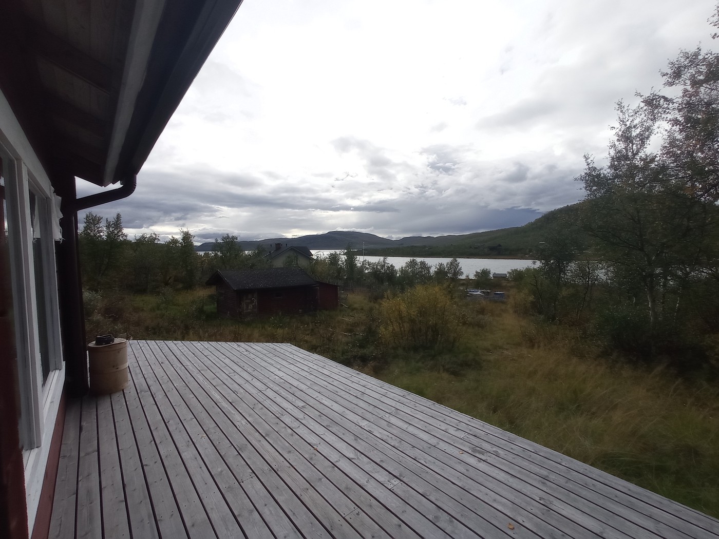 deck veranda wood cabin Kilpisjärvi accommodation in Finland