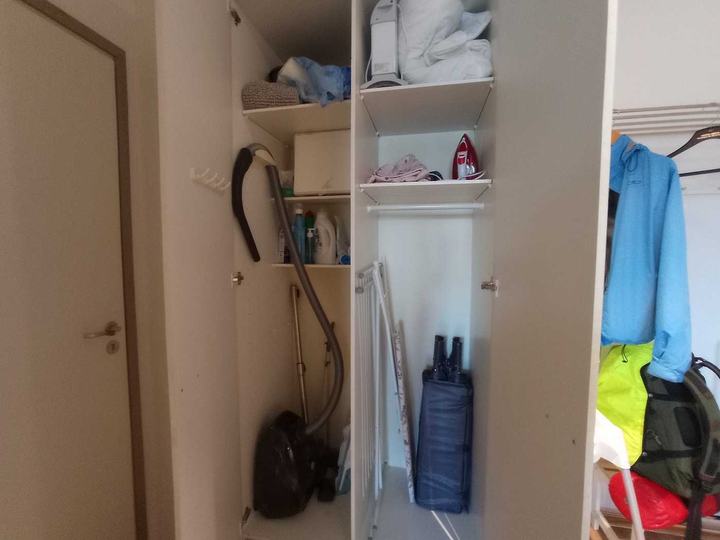 closet with drying rack and cleaning supplies Turku Finland