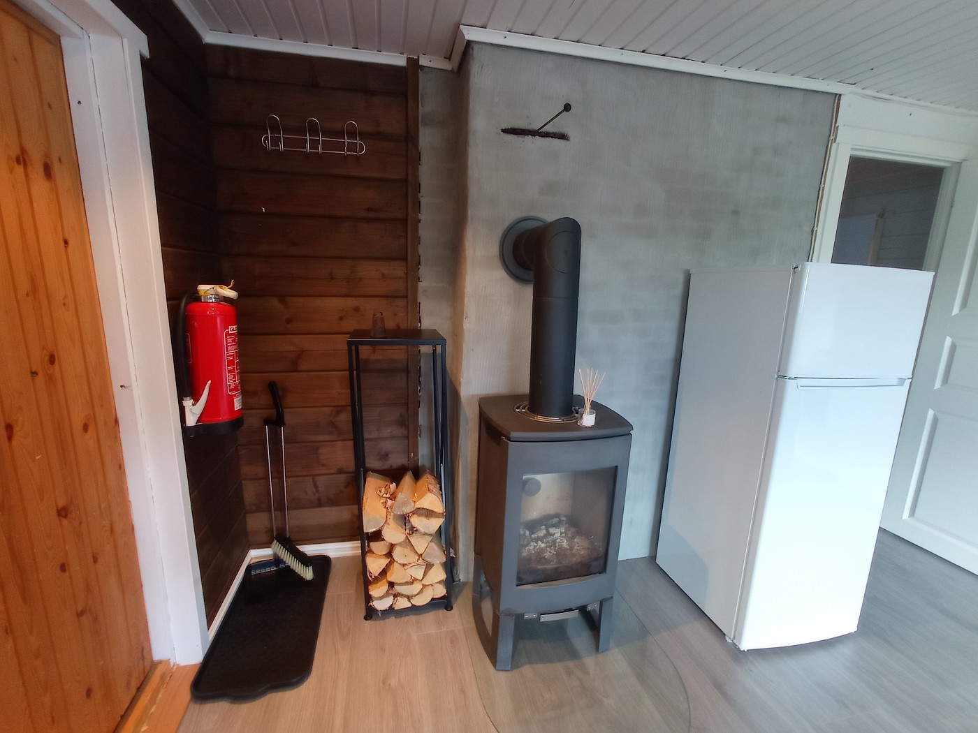 wood stove hearth fireplace Kilpisjärvi northern Finland Lapland Sami area fridge