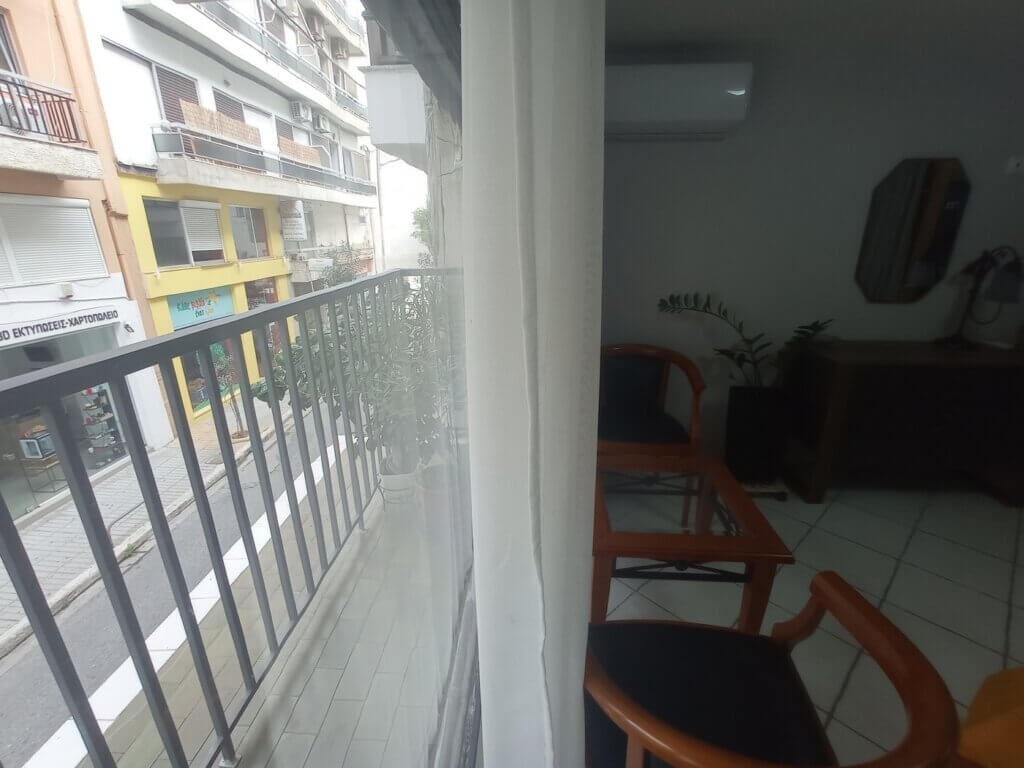 Chania apartment skinny balcony bedroom sitting area
