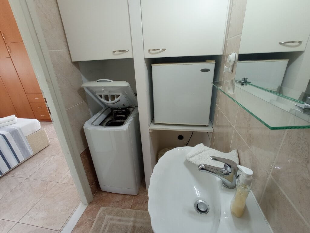 upstairs bathroom toilet sink washing machine fridge Paleochora