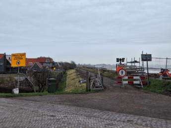 Oost-Vlieland dike maintenance work raising the embankment flood protection barrier Wadden Sea
