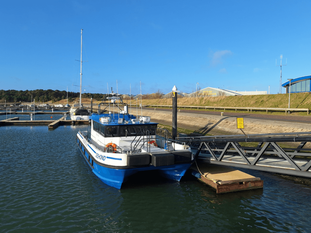 Zeehond boat catamaran ferry foot passengers bicycles no cars Vlieland to Terschelling winter schedule
