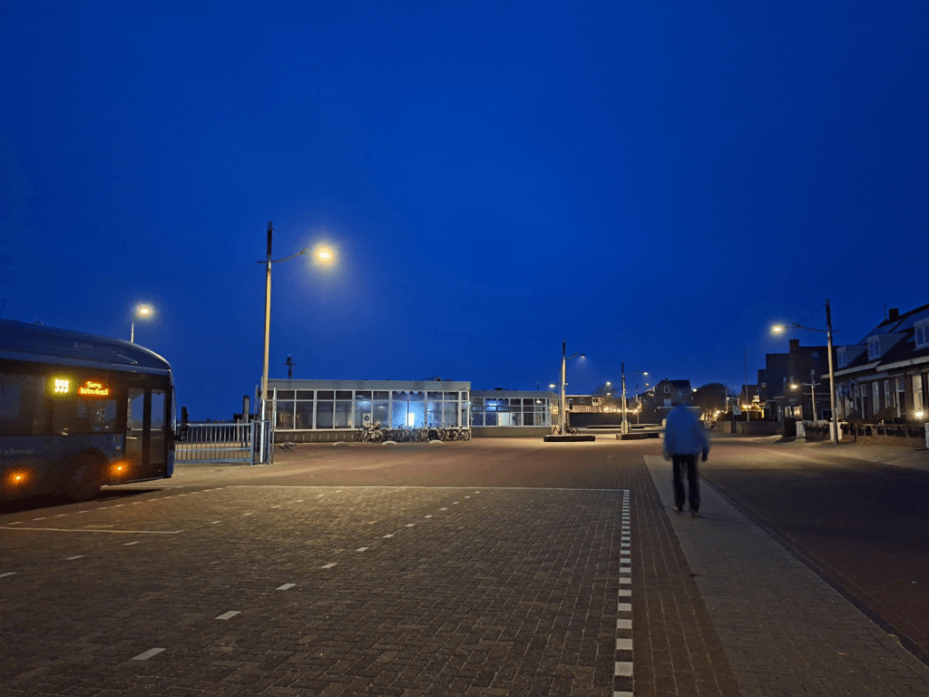 Oost-Vlieland harbor ferry port at night in winter bus station