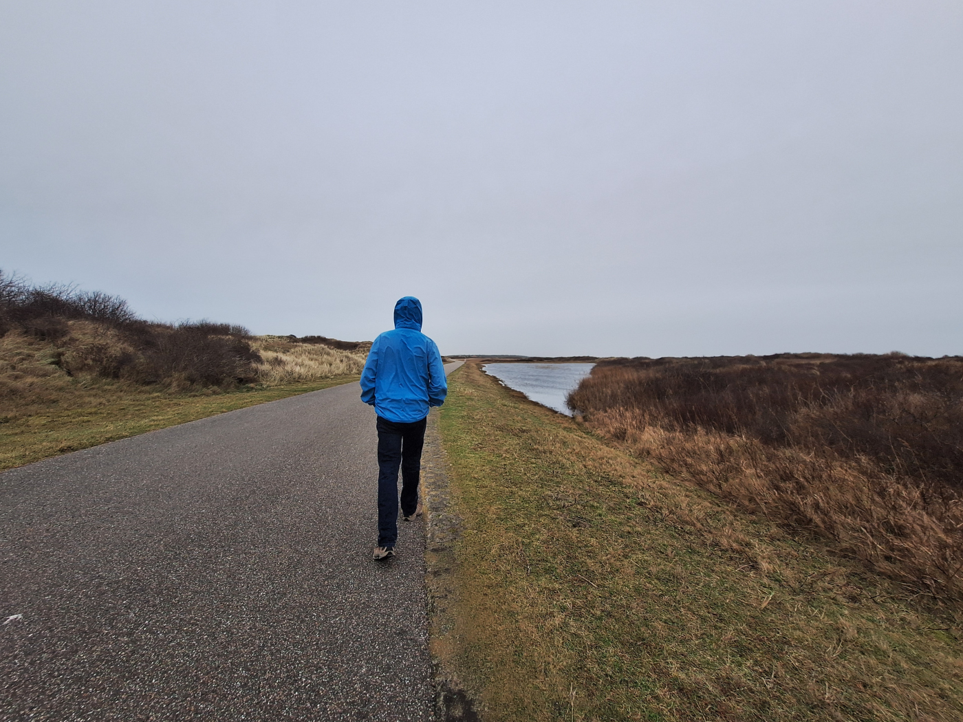 long asphalt road from Vliehors Range to 't Posthuys hitchhiking on Vlieland the Netherlands