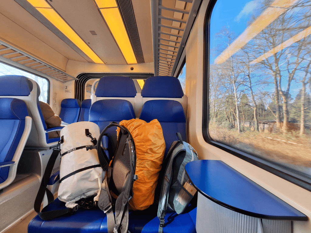 train ride the Netherlands to Germany with dry bags for kayaking
