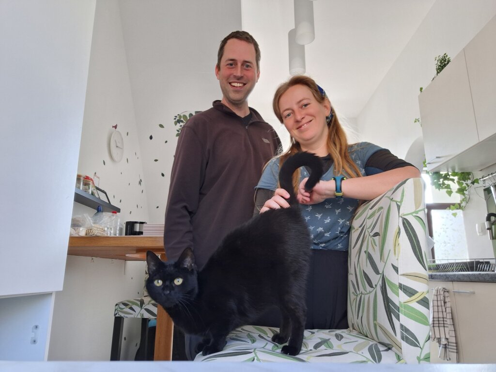 Jonas and Iris with Kali the cat at That Cat Flat Ljubljana accommodation in Slovenia