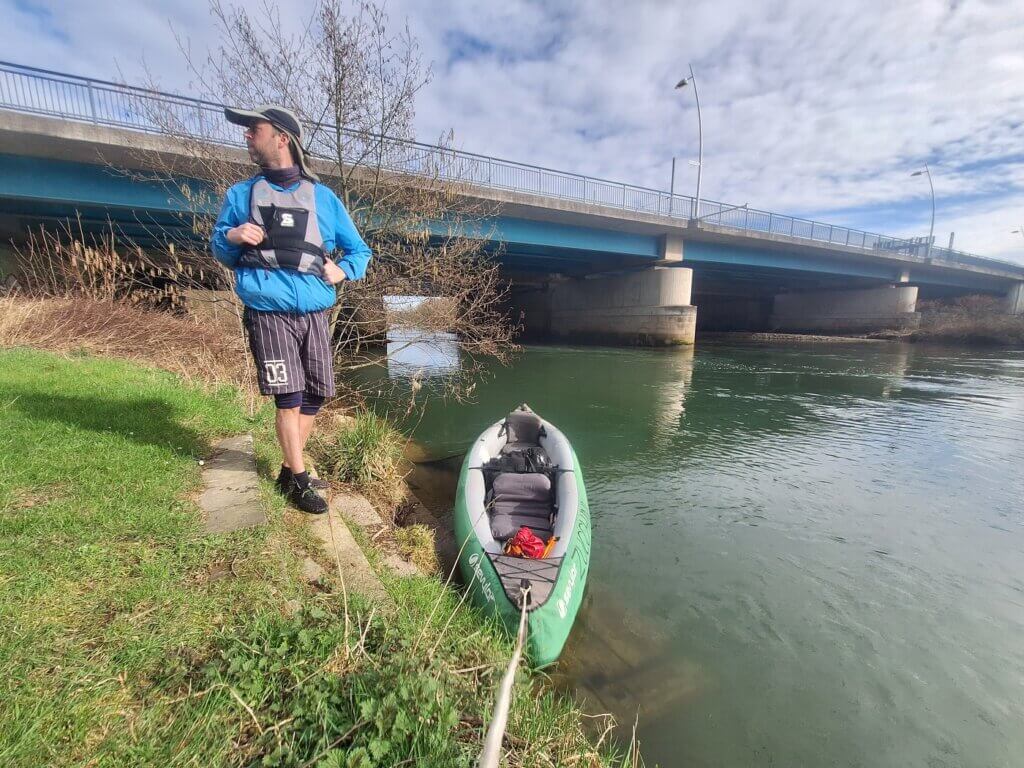kayaking the Agger river portaging the weir in Germany Siegburg