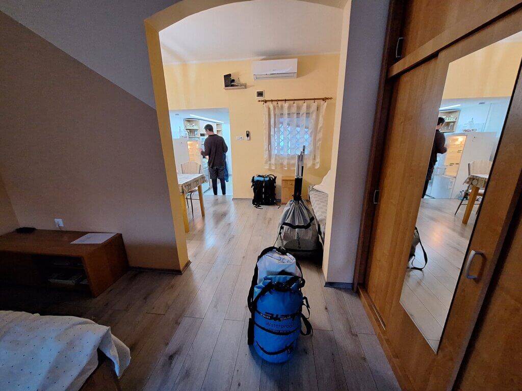 departure Mohács to Apatin kayak trip preparation indoors packing