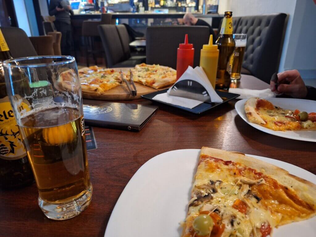arrival meal pizza and beer Apatin Serbia vegetarian