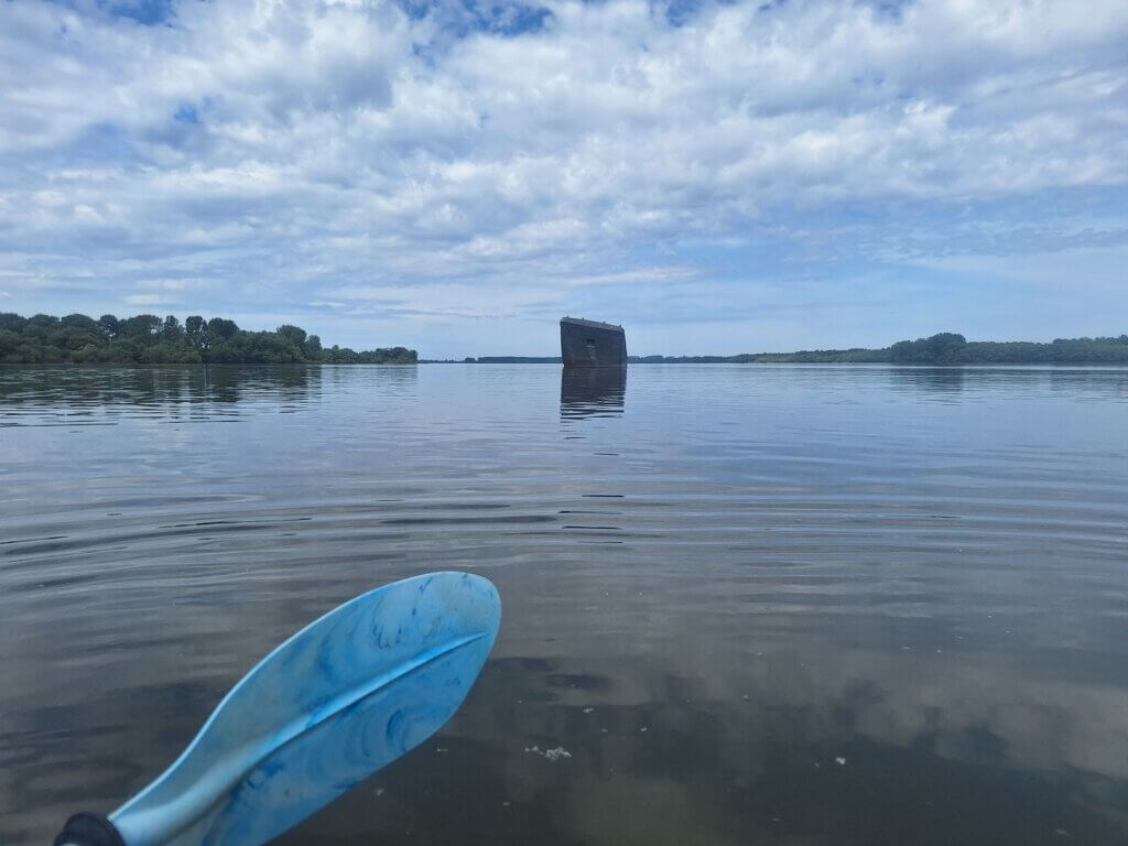 Zucchini kayaking Danube sunken barge in Serbia