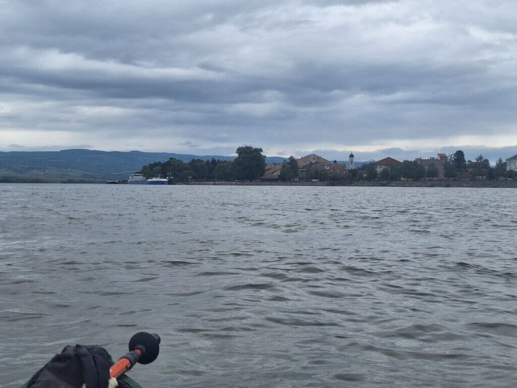 arriving in Veliko Gradiste Kosava wind kayaking Danube Serbia church cruise jetty pontoon