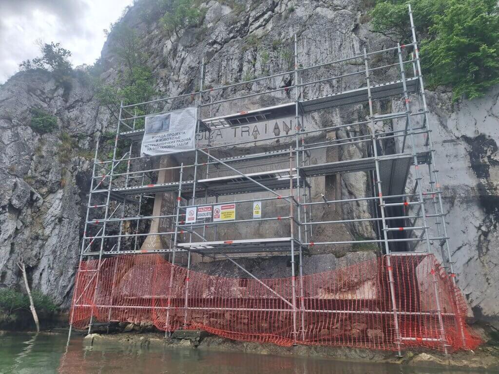 Tabula Traiana Danube River kayaking Serbia Decebalus statue under renovation maintenance graffiti vandalism tourism Romania