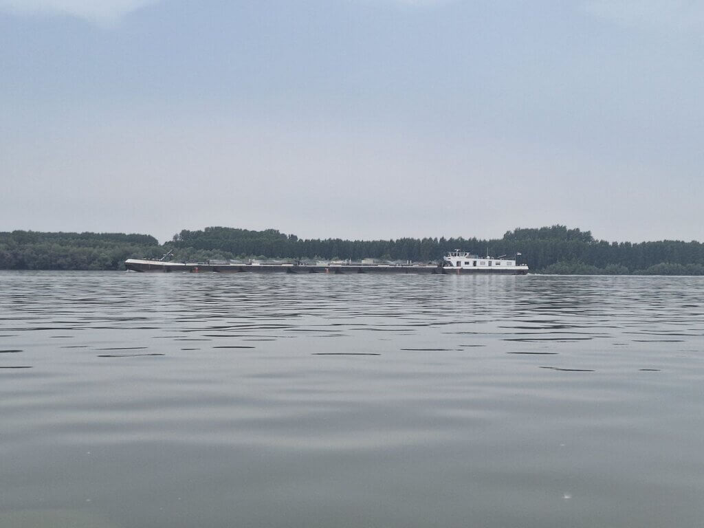 gas oil inland shipping ship cargo spraying water deck Danube River Romania Bulgaria heat wave June 2024 longest day of the year