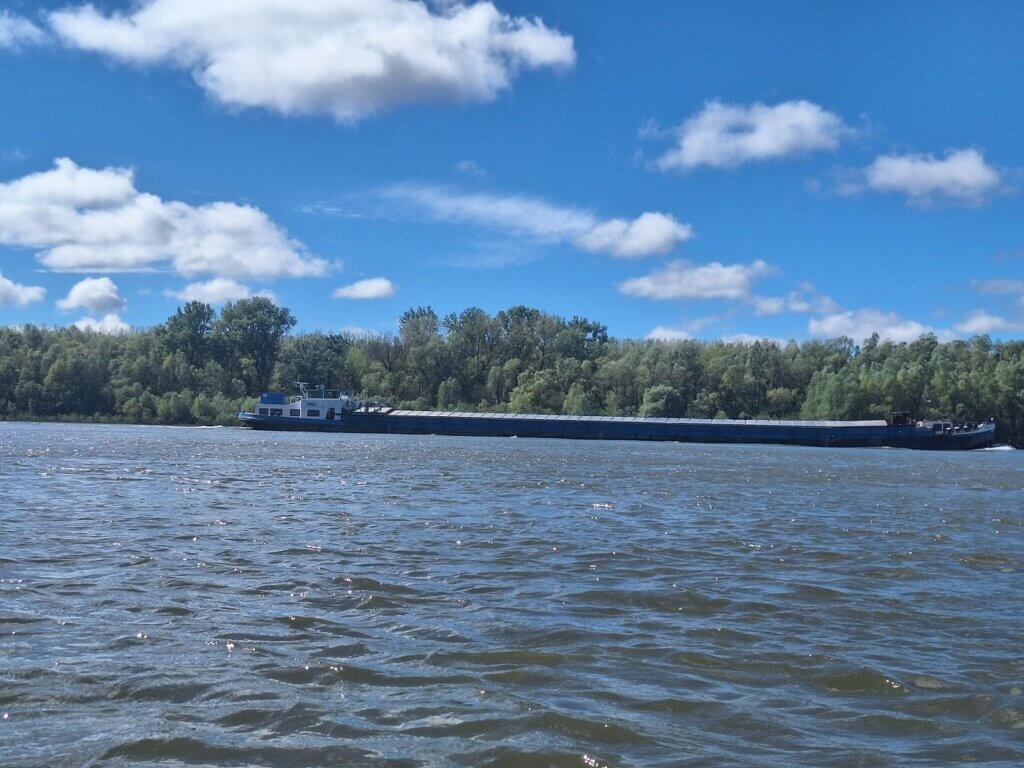 cargo ship near Drava confluence inland shipping Danube river