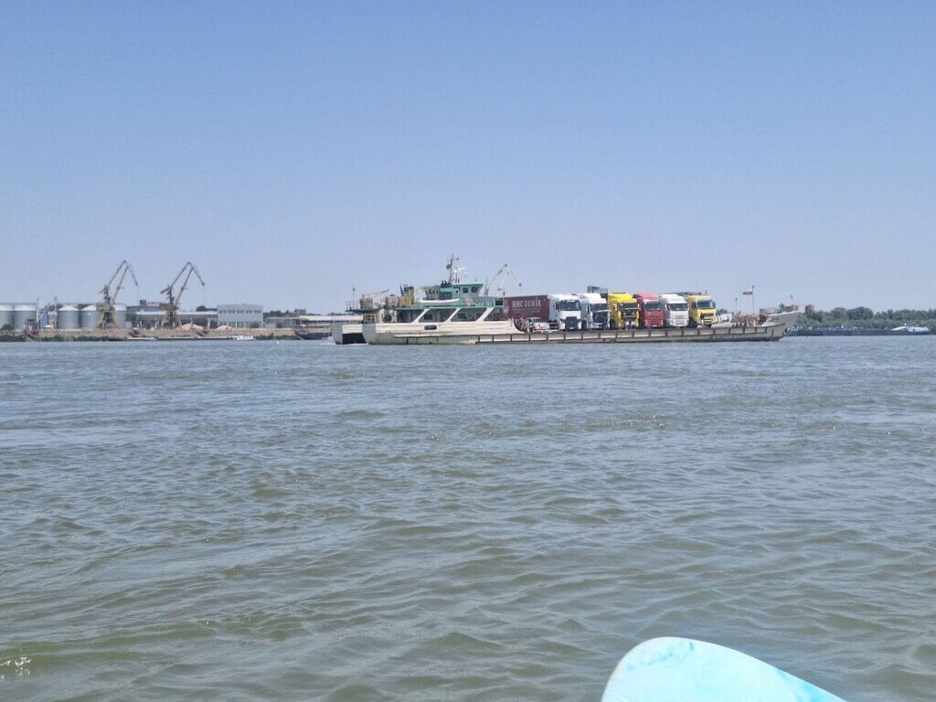 diagonal ferry crossing Danube River Svishtov Bulgaria to Zimnicea Romania trucks port traffic kayaking