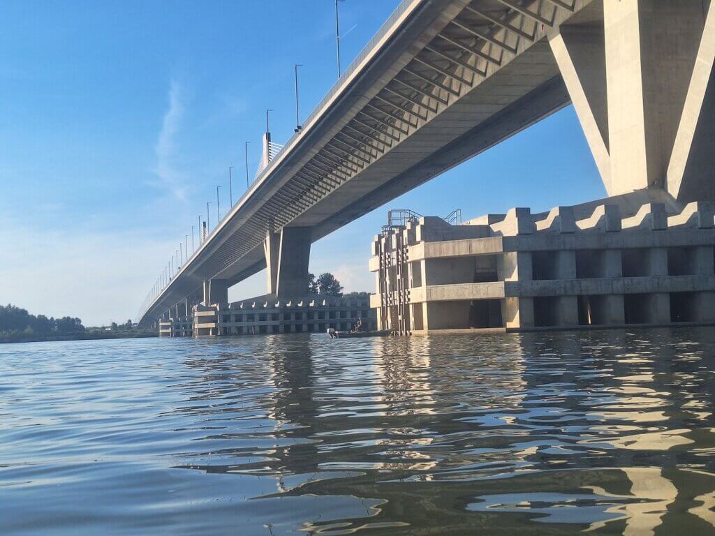 New Europe Bridge Danube River Bulgaria Romania Vidin Calafat fisherman pillar pylon support fishing tailrace currents