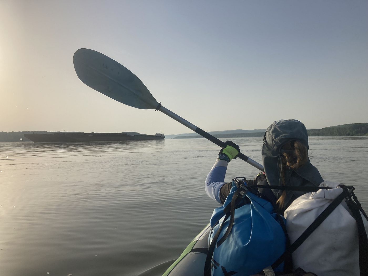Iris Veldwijk kayaking Danube River 7 30 in the morning cargo ship river inland shipping