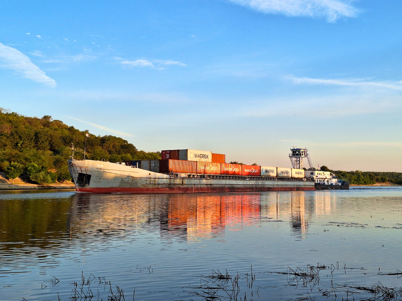 Danube kayak trip day 80 Cernavoda to Harsova Danube Black Sea canal morning sunrise cargo ship containers Constanta Black Sea Romania