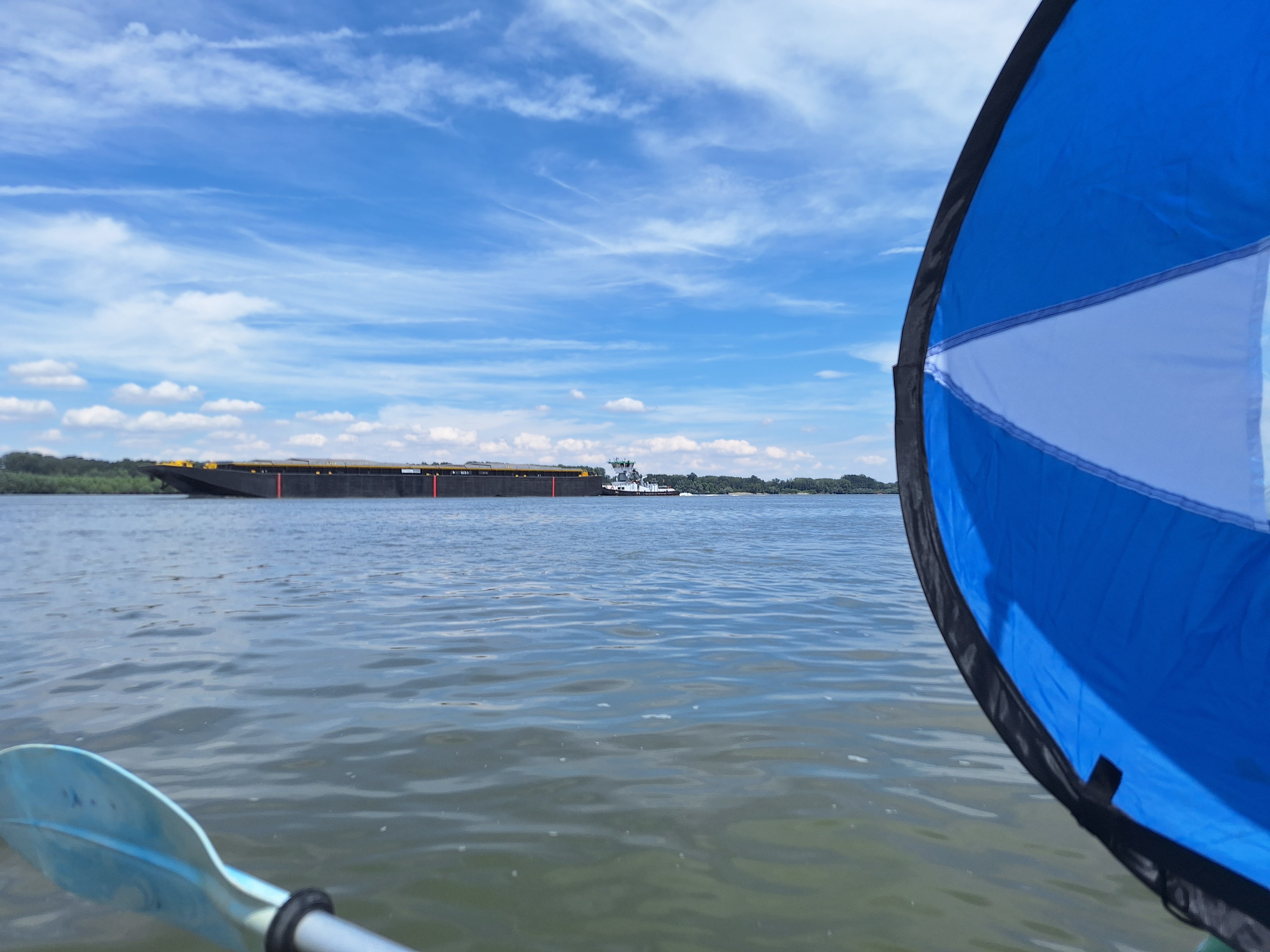 friendly Romanian ship captains empty barges pushtow upstream Danube River Golyam Brashlem river island Bulgaria