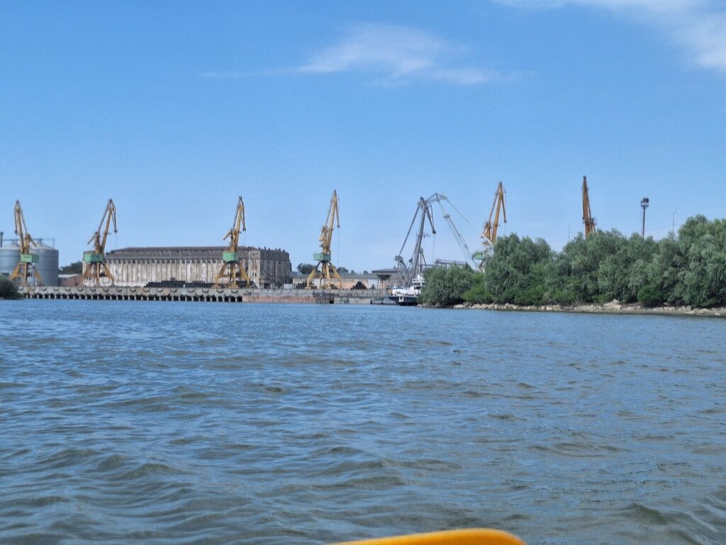 cranes of northern port of Braila shipping grain Danube River Black Sea factory