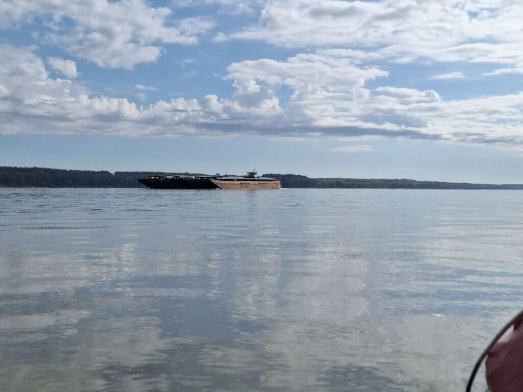 triple wide barge Danube traveling upstream Bulgaria Romania pusherboat pushtow Tutrakan to Silistra
