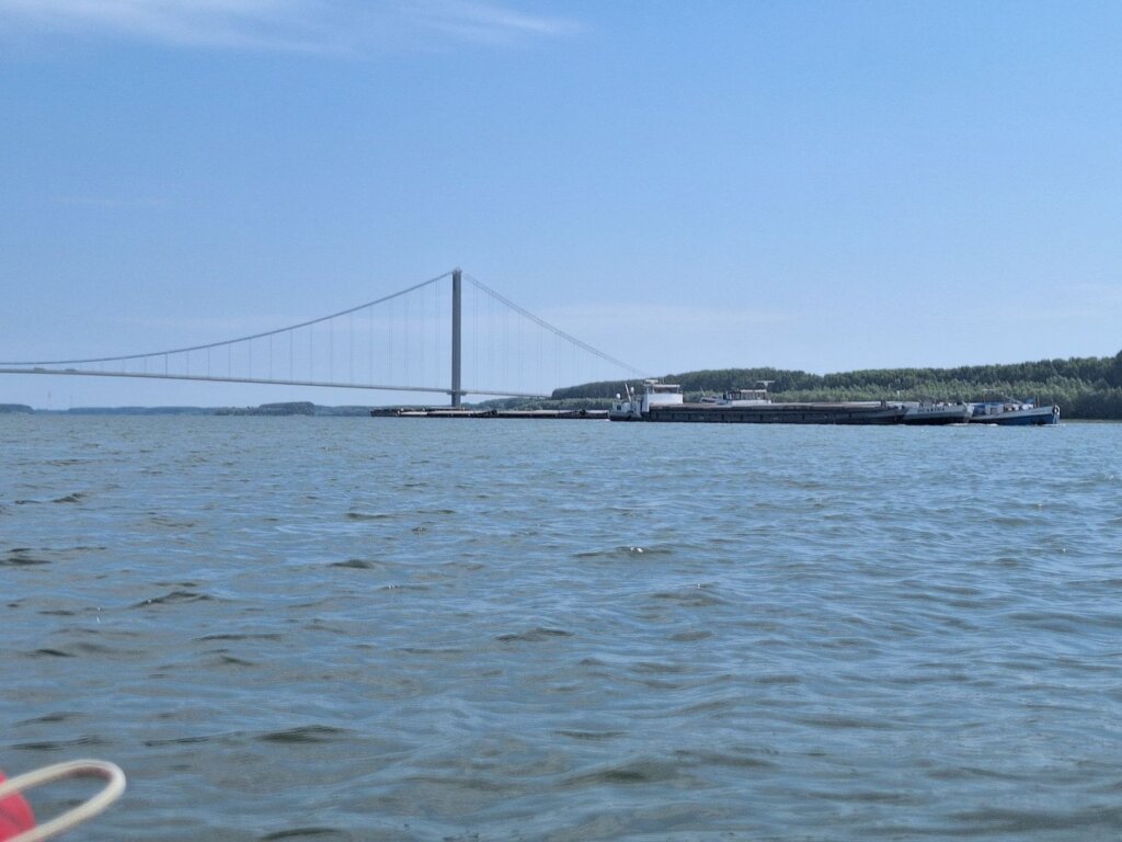 Ocarina barge Danube River Braila bridge shipping many barges pushing upstream Romania
