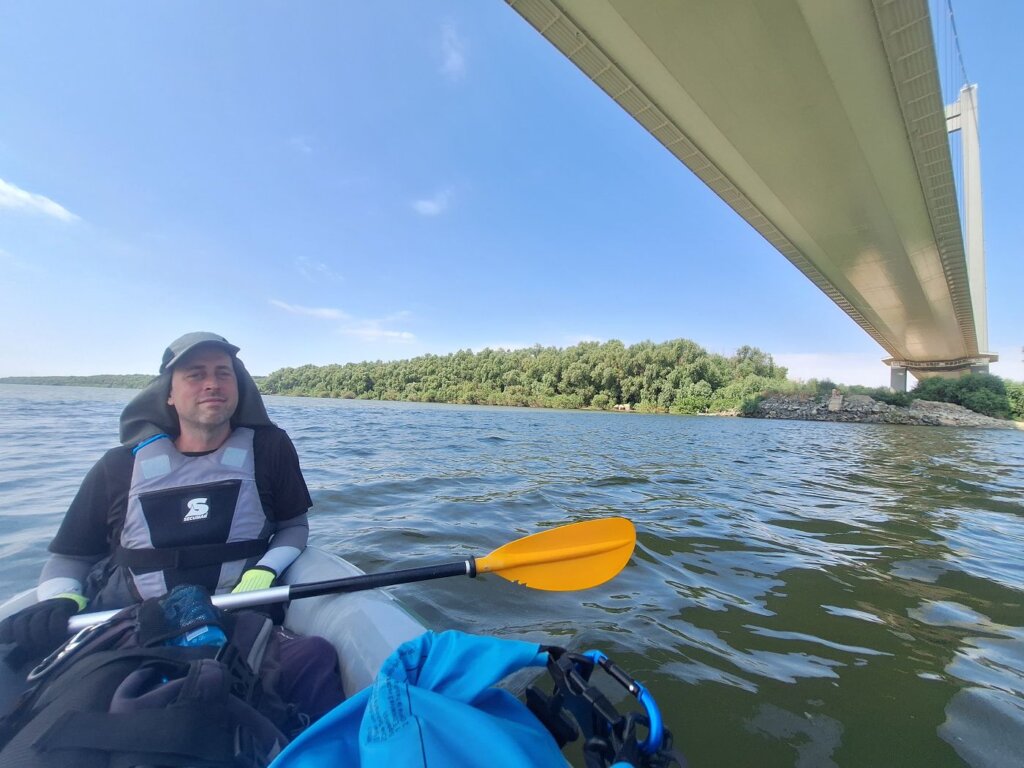 Jonas below the Braila Bridge Tulcea county shadow kayaking trip to Galati Romania