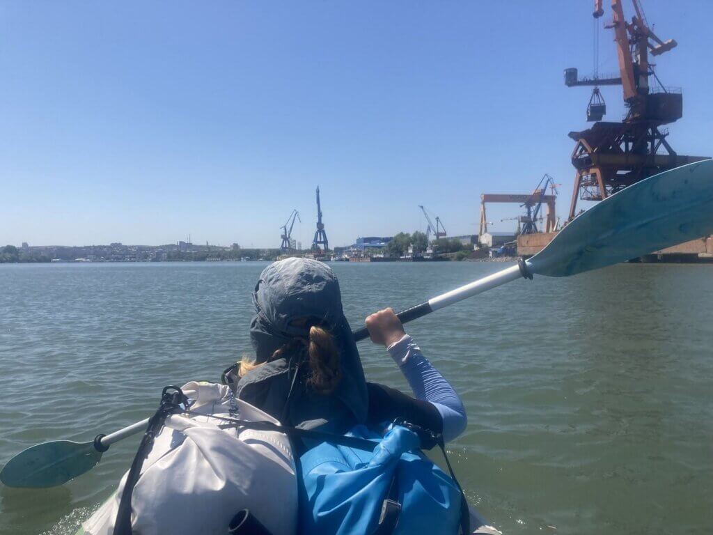 Iris Veldwijk kayaking port of Tulcea Romania travel ships to the Black Sea cargo cranes transshipment Europe to the world