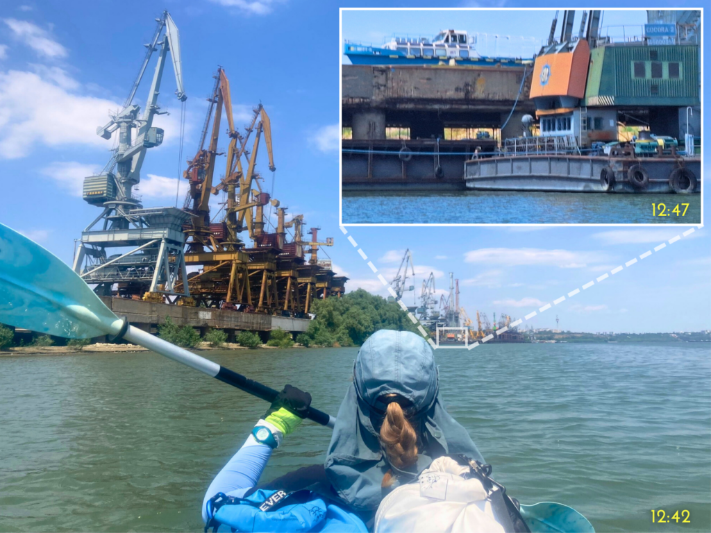 Iris Veldwijk kayaking past impressive cranes on the Danube River Romania Galati