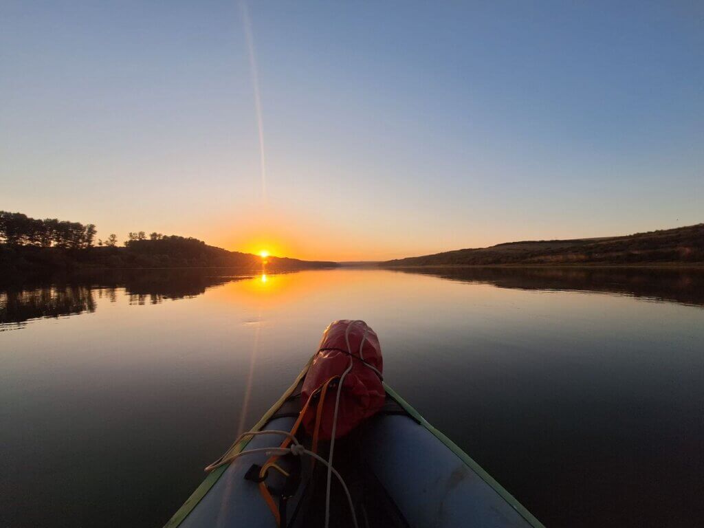 first rays of sunlight sunrise on the Danube River Ostrov Pacuiul lui Soare Romania