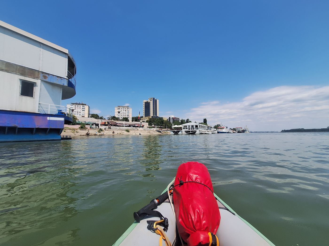 landing spot kayak trip day 82 Galati Romania river floating restaurant muddy landing spot cables kayaking inflatable