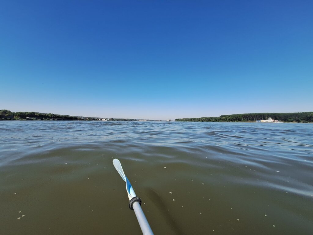 Zucchini kayaking Danube River crossing Bulgaria to Romania upstream Silistra port Balkan paddle traffic shipping lane