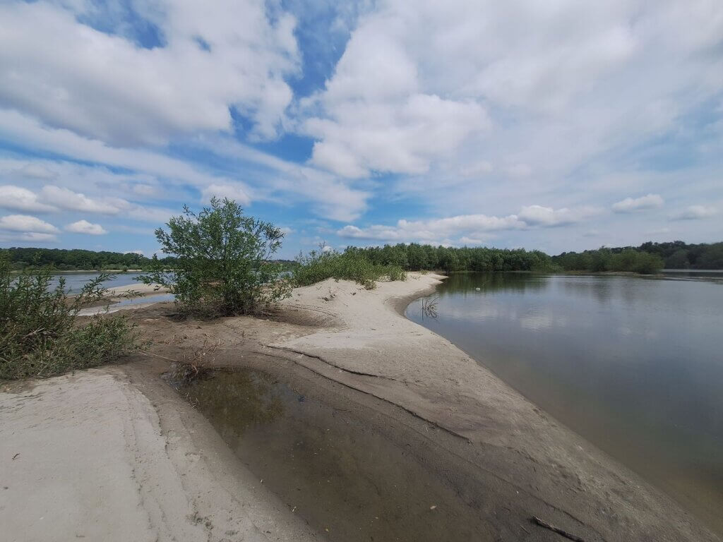 beautiful Danube river island beach Belegish Serbia sandy reflections clouds