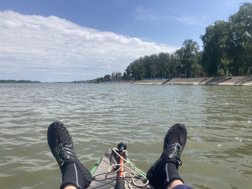 Jonas POV front of the kayak little leg space feet outside of Zucchini