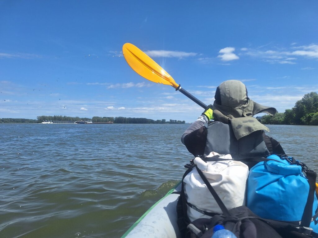 Jonas still kayaking in the front to Smederevo port castle Serbia Danube