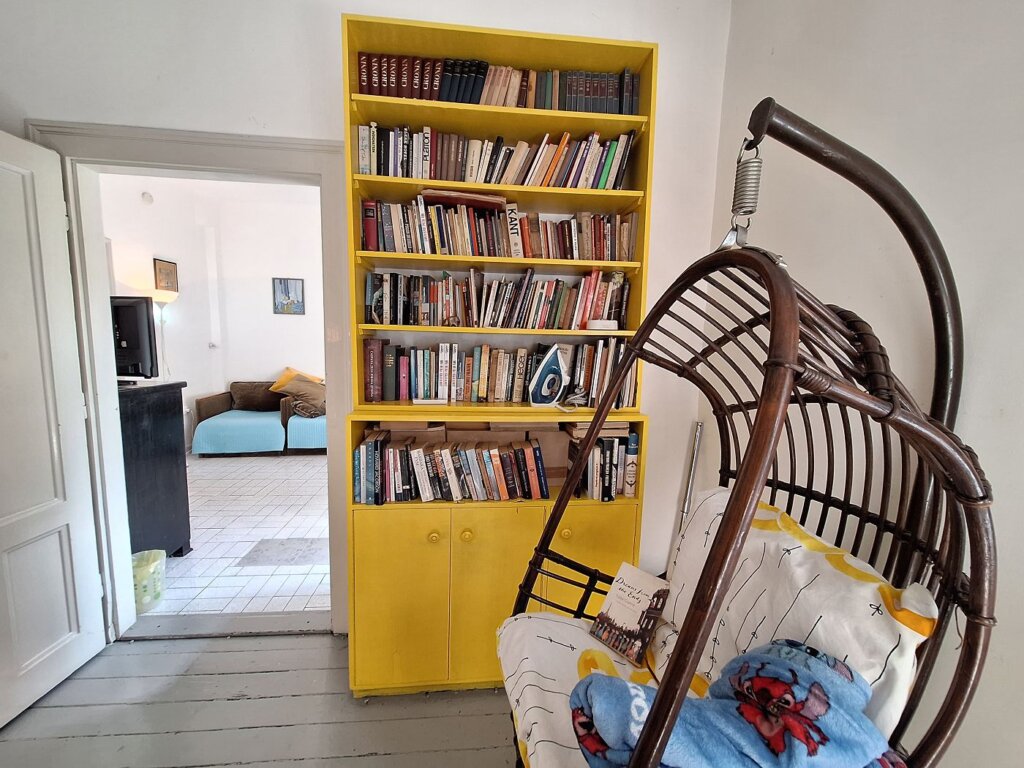 apartment rentals in Belgrade with a bookshelf library reading nook comfy Serbia